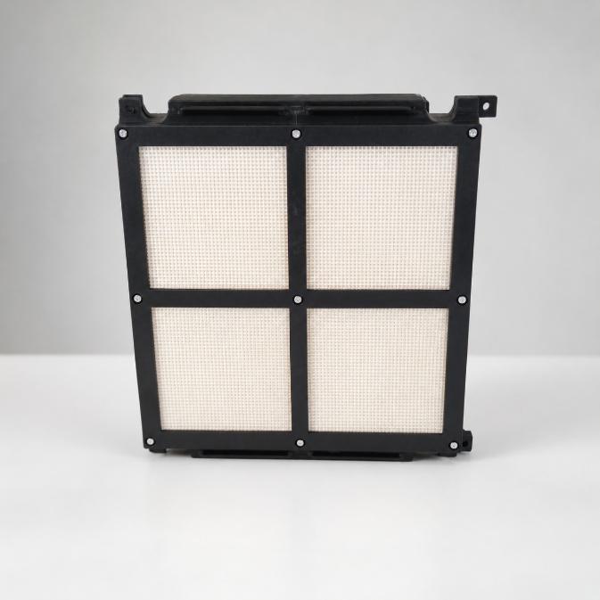 The current CarBonne capture cartridge: four sorbent-coated monolith panels held in a black modular frame.